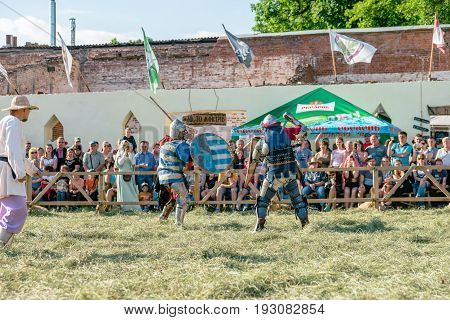 TROSTYANETS, UKRAINE - JUNE 25, 2017: Old Castle fest in action. Knights fight just beginning. This is 8 time traditional fest with historical costumes, foods and fights.