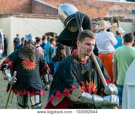 TROSTYANETS, UKRAINE - JUNE 25, 2017: Old Castle fest in action. Knights fight just beginning. This is 8 time traditional fest with historical costumes, foods and fights.