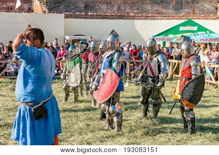TROSTYANETS, UKRAINE - JUNE 25, 2017: Old Castle fest in action. Knights fight just beginning. This is 8 time traditional fest with historical costumes, foods and fights.