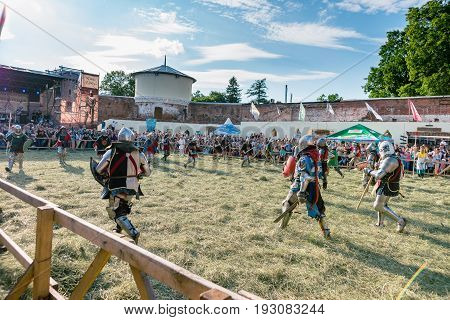 TROSTYANETS, UKRAINE - JUNE 25, 2017: Old Castle fest in action. Knights fight just beginning. This is 8 time traditional fest with historical costumes, foods and fights.