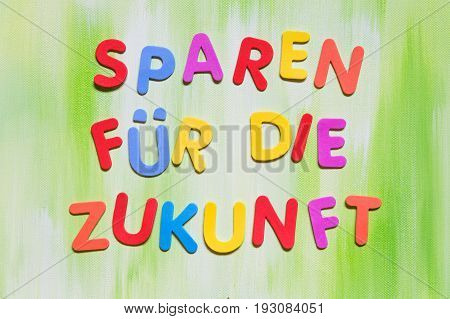 Colorful Letters, German Text, Concept Spare Money For The Future