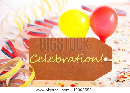 One Label With English Text Celebration. Party Decoration Like Streamer, Confetti And Balloons. Wooden Background With Vintage, Retro Or Rustic Syle