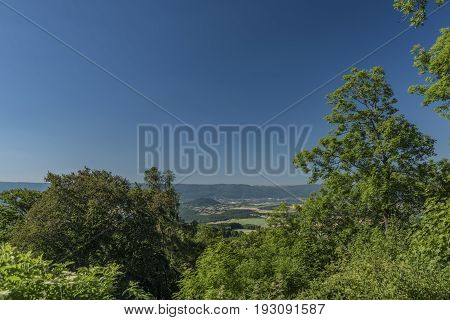 View from Sukoslav castle in hot summer day with green forest