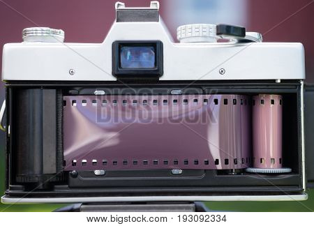 Back panel opened and film loaded into a 35mm SLR camera