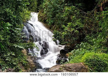 a cascade of water falling from a height, formed when a river or stream flows over a precipice or steep incline