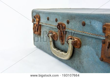 old handle and lock of blue vintage suitcase on white background