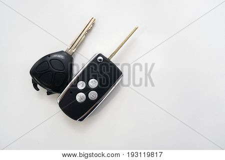 isolated old and modern car remote control