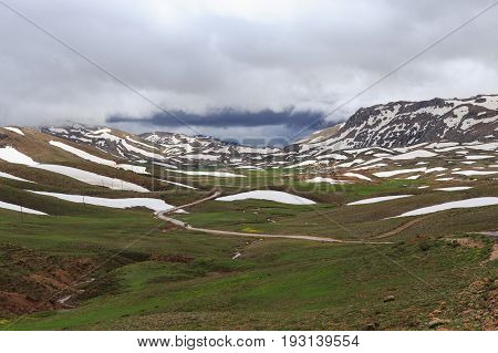 Mountains Covered By Melting Snow