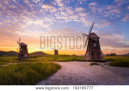 Beautiful Landscape And Traditional Windmills After Sunset, Incheon South Korea, Sorae Ecology Wetla