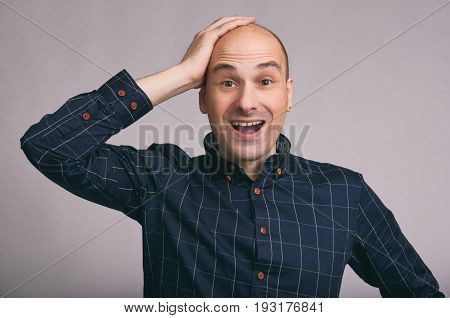 Happy Bald Young Man Shoked