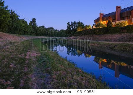 night landscape with the image of channel in Rovigo, Italy