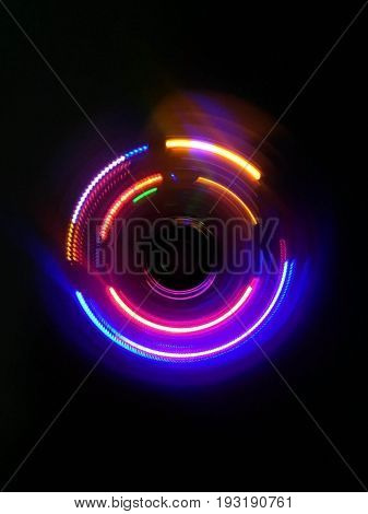Pink purple circle wave in dark background