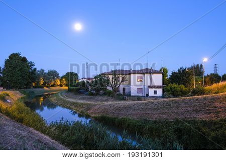 night landscape with the image of channel in Rovigo, Italy