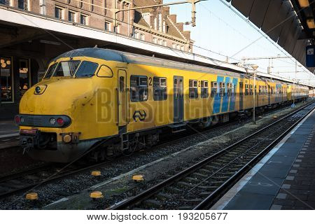 MAASTRICHT NETHERLANDS - JANUARY 17 2016: A passenger train. The main railway station. Railway transport of the Netherlands.