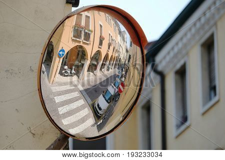 PADOVA, ITALY - June, 22, 2017: veiw from a street mirror to a street in a center of Padova, Italy
