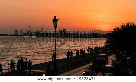 Thessaloniki Port at Dusk Time Sunset behide the mountain
