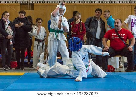 BERLIN - MARCH 18 2017: Fighters on the tatami. Knockdown. European championship Kyokushin World Union (KWU) for Children and Youth.