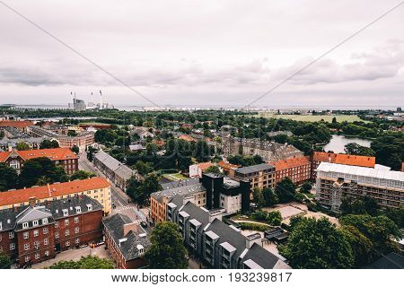 Copenhagen Denmark - August 12 2016: Aerial view of Christiania in Copenhagen a cloudy day of summer. Also known as Freetown Christiania is an autonomous settlement.
