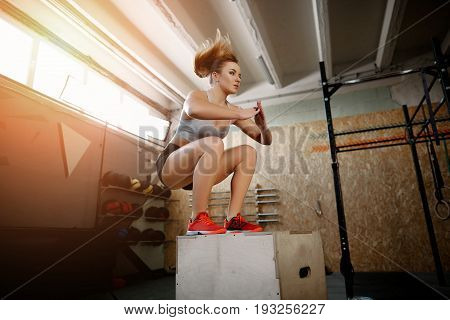 Cute Girl Doing Exercises In Gym