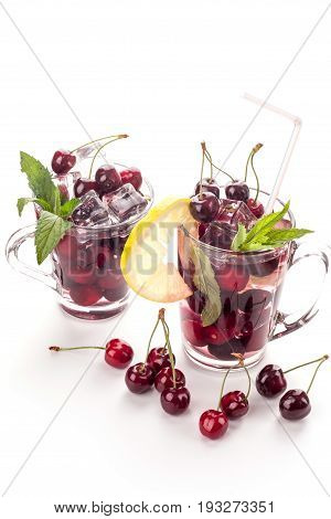 Ice cream and cherry juice isolated on white background
