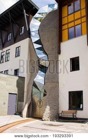 Bad Gastein Austria - JUNE 09 2017: Entrance for the railway into the mountain. At the health Resort Paselstollen a former Gold mining tunnel Bad Gastein Austria Europe.