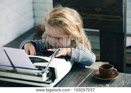Child Or Small Boy Or Businessman Kid With Typewriter