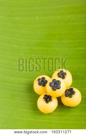 Thai desert on green banana leaf call cha mong kud