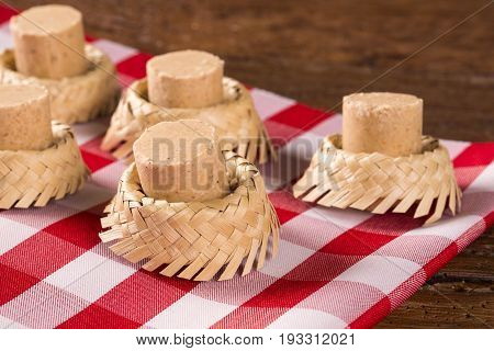 Pacoca - Brazilian Candy Of Ground Peanut With Wicker Hat Of Festivity Festa Junina Decoration.