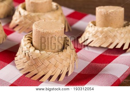 Pacoca - Brazilian Candy Of Ground Peanut With Wicker Hat Of Festivity Festa Junina Decoration.