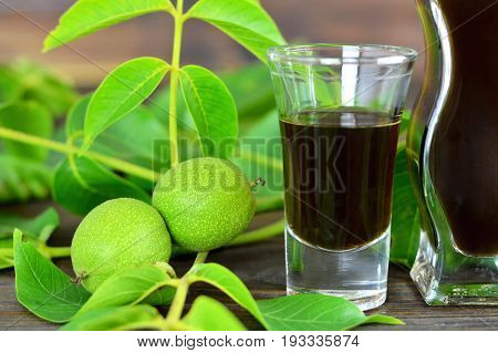 Close up of walnut liqueur in the glass
