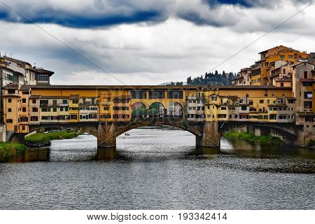 Ponte Vecchio bridge on the river in Florence Italy