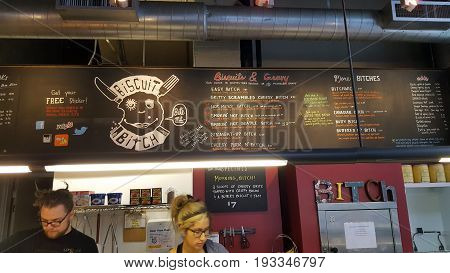 SEATTLE-- JUNE 24: People work inside Biscuit Bitch coffee shop on June 24 2016 in Seattle WA.