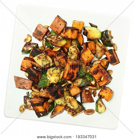 Sweet Potato Hash with zuicchini and roasted pepitas.