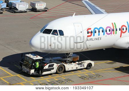 Amsterdam The Netherlands - May 26th 2017: D-ABDB Small Planet Airlines Germany Airbus A320 pulled back from the gate at Schiphol International Airport