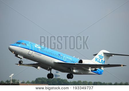 Amsterdam the Netherlands - June 2nd 2017: PH-KZC KLM Cityhopper Fokker F70 taking off from Polderbaan Runway Amsterdam Airport Schiphol