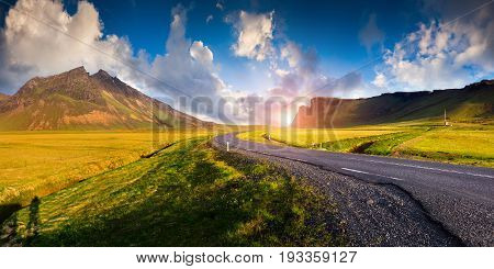 Typical Icelandic Landscape With Asphalt Road
