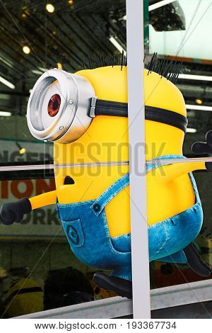 OSAKA, JAPAN - June 24, 2017 : Statue of "HAPPY MINION", located in Universal Studios Japan, Osaka, Japan. Minions are famous character from Despicable Me animation.