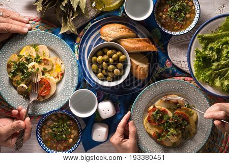 Chickpea soup Revithia and vegetable stew Briam on the table horizontal