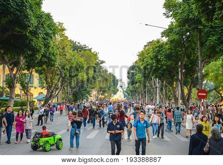 Hanoi Vietnam - Feb 19 2107 : People walking on Dinh Tien Hoang the walking street by Hoan Kiem lake center of Hanoi