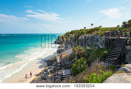Tulum Mexico - April 20 2016: Sea view from the Mayan city archaeological site with many tourists