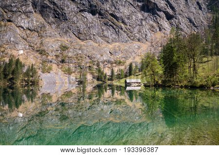 Beautiful reflections at Lake Obersee Bavaria Germany