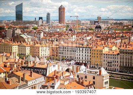 Aerial cityscape view with beautiful old buildings and skyscrapers in Lyon city