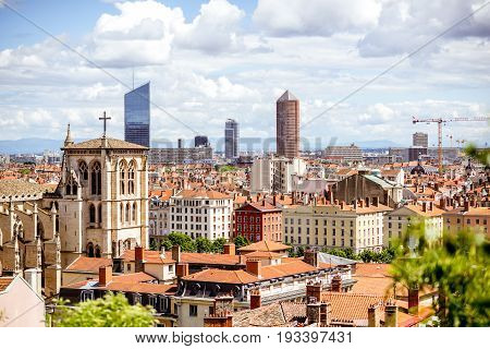 Aerial cityscape view with saint Johns cathedral and skyscrapers in Lyon city