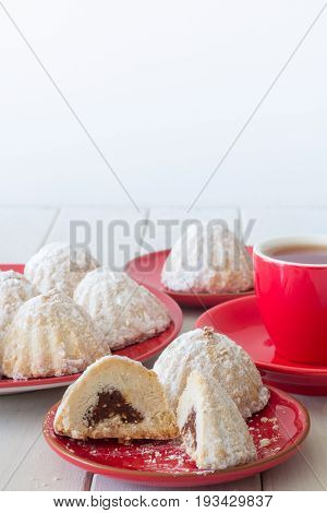 Egyptian Aid Cookies (Kahk) with Tea Vertical Copy Space Top