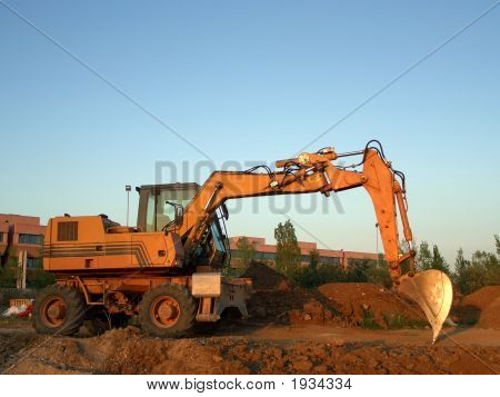 Orange gravemaskine