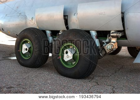 The chassis of the transport aircraft. Close-up. The chassis of transport aircraft are multi-wheeled on relatively short racks.
