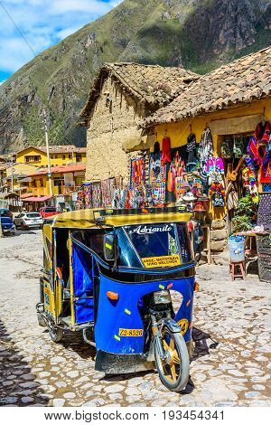 OLLANTAYTAMBO, PERU - 27 APRIL 2017: Streets of the small, medieval city of Ollantaytambo, with old houses on Andes Mountains
