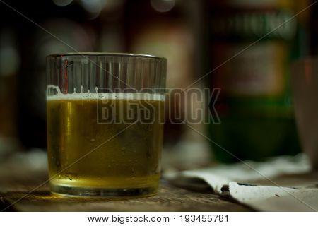 Traditional Macedonian food different kind of meat, salats, breads, beer and Rakia - krvavica sausage with shopska salad, shallow dof