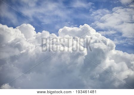 Dramatic Cumulus Clouds With High Level Cirrocumulus Clouds For Use As Background