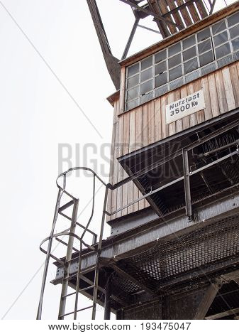 BERLIN GERMANY - JUNE 21 2017: Old Wooden Crane In Tempelhofer Hafen Meaning Harbor of Tempelhof In German Language In Berlin